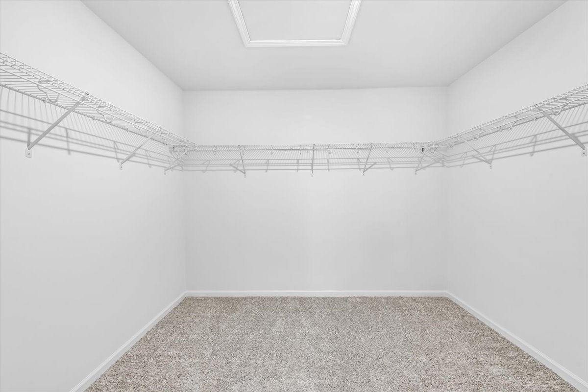 102 Hedgerow Drive Elgin, IL 60124 - Photo 21 of 48 a view of a room with racks on the wall