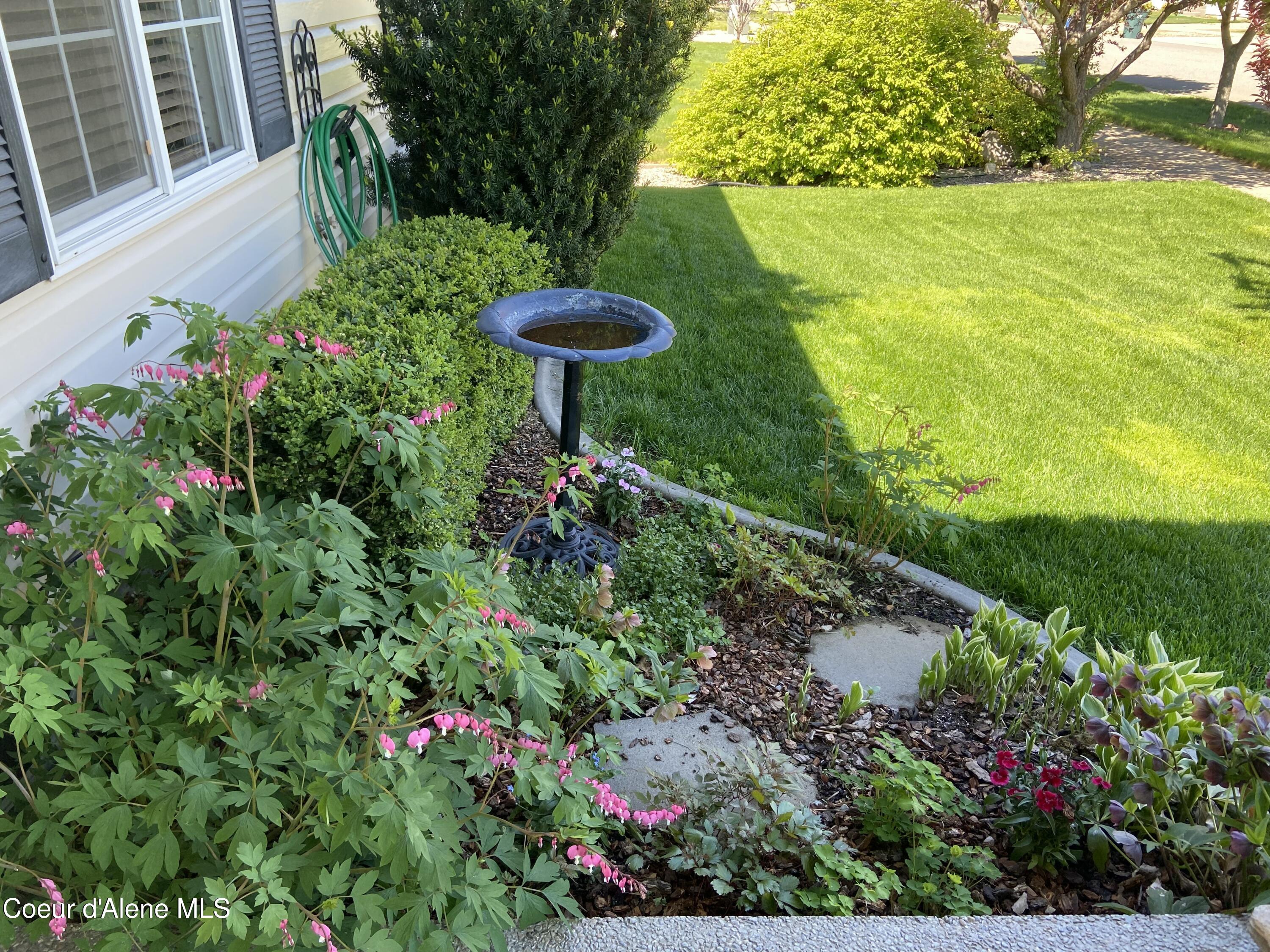 6494 Buffalo Grass Lane Rathdrum, ID 83858 - Photo 25 of 26 Beautiful flower beds