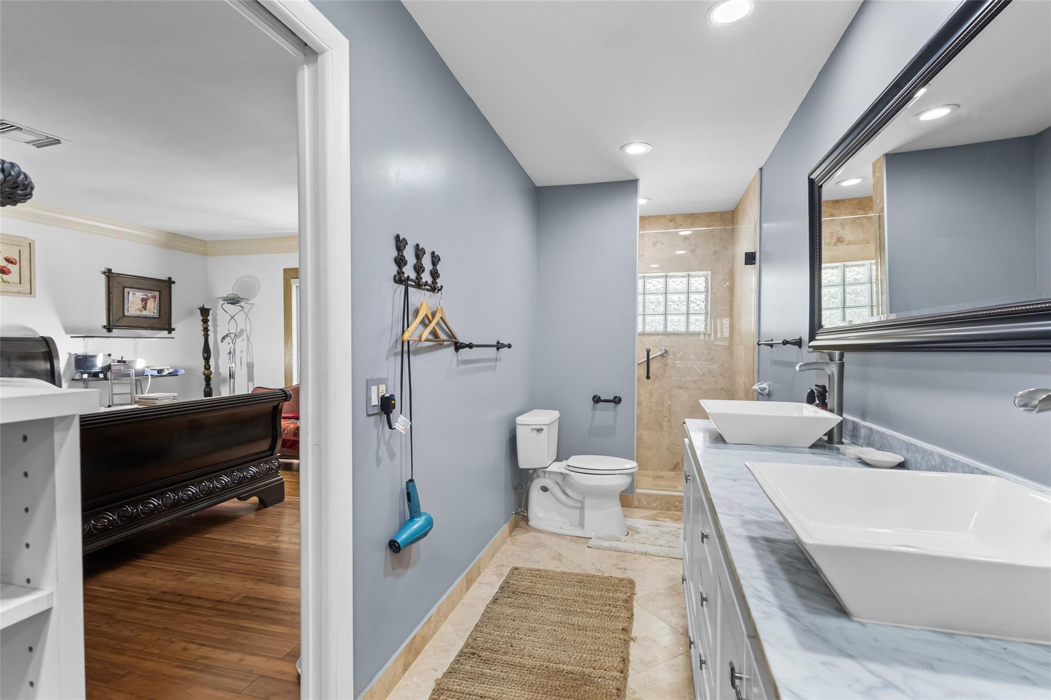 5223 Deerhurst Crescent Circle Boca Raton, FL 33486 - Photo 37 of 51 a spacious bathroom with a bathtub sink and toilet