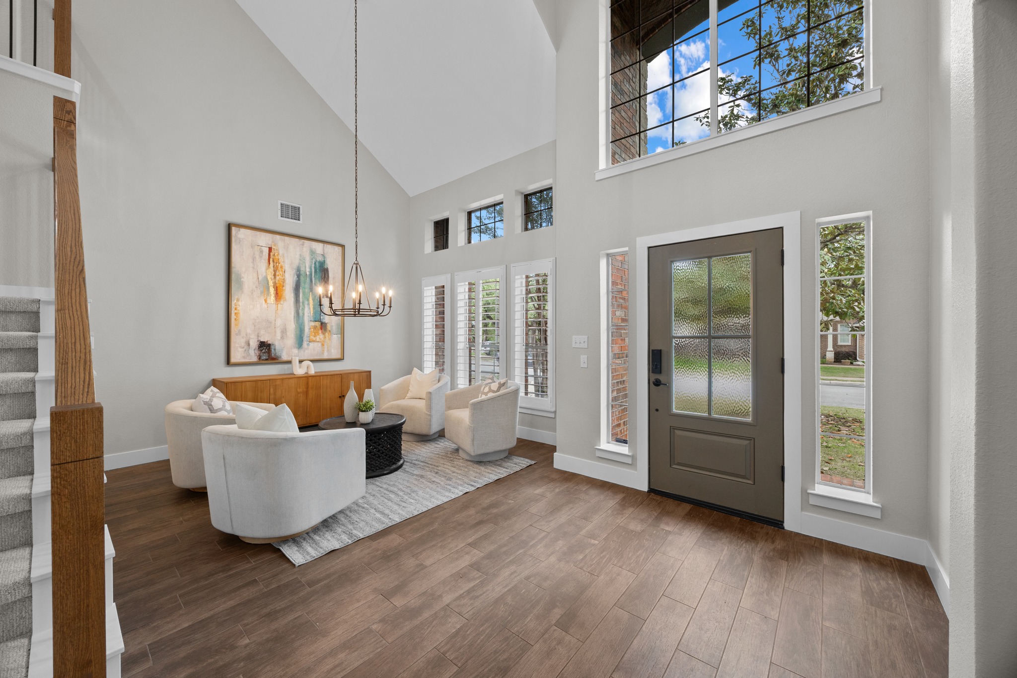 6900 Magenta Lane Austin, TX 78739 - Photo 3 of 40 a living room with furniture and a large window