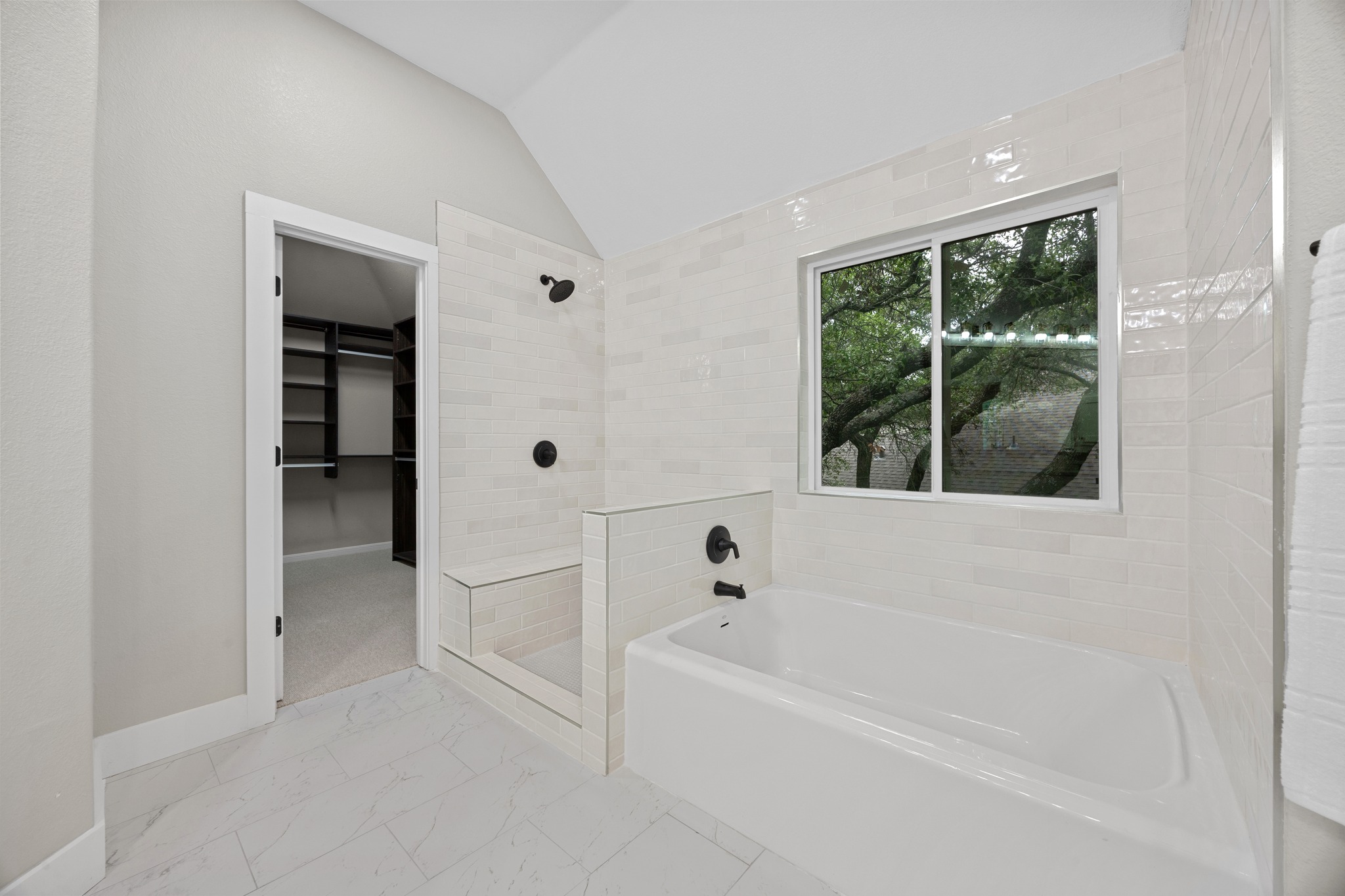 6900 Magenta Lane Austin, TX 78739 - Photo 31 of 40 a white bath tub sitting next to a window