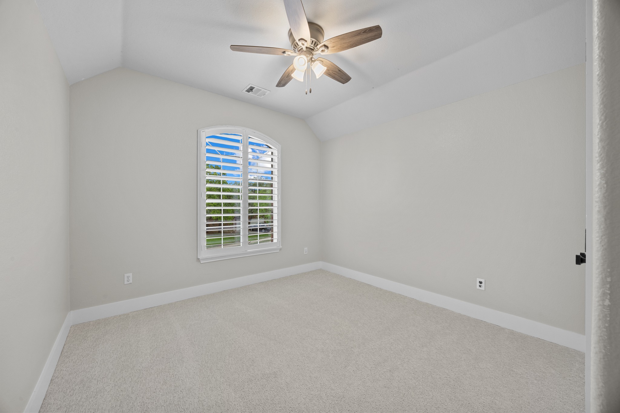 6900 Magenta Lane Austin, TX 78739 - Photo 33 of 40 an empty room with windows and fan