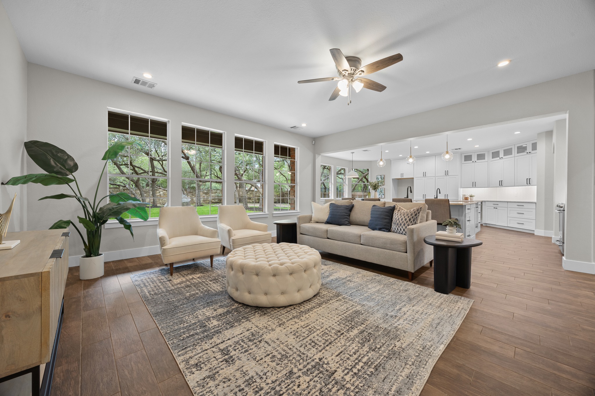 6900 Magenta Lane Austin, TX 78739 - Photo 8 of 40 a living room with furniture and a large window