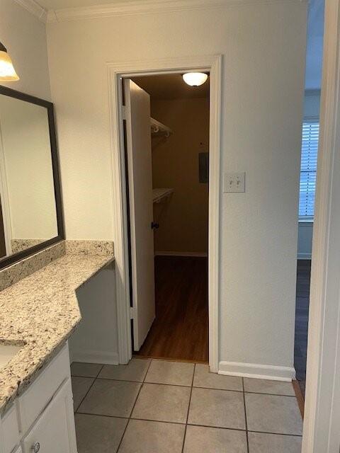 4748 Old Bent Tree Lane, Unit 1905 Dallas, TX 75287 - Photo 5 of 18 a bathroom with a granite countertop sink and a mirror