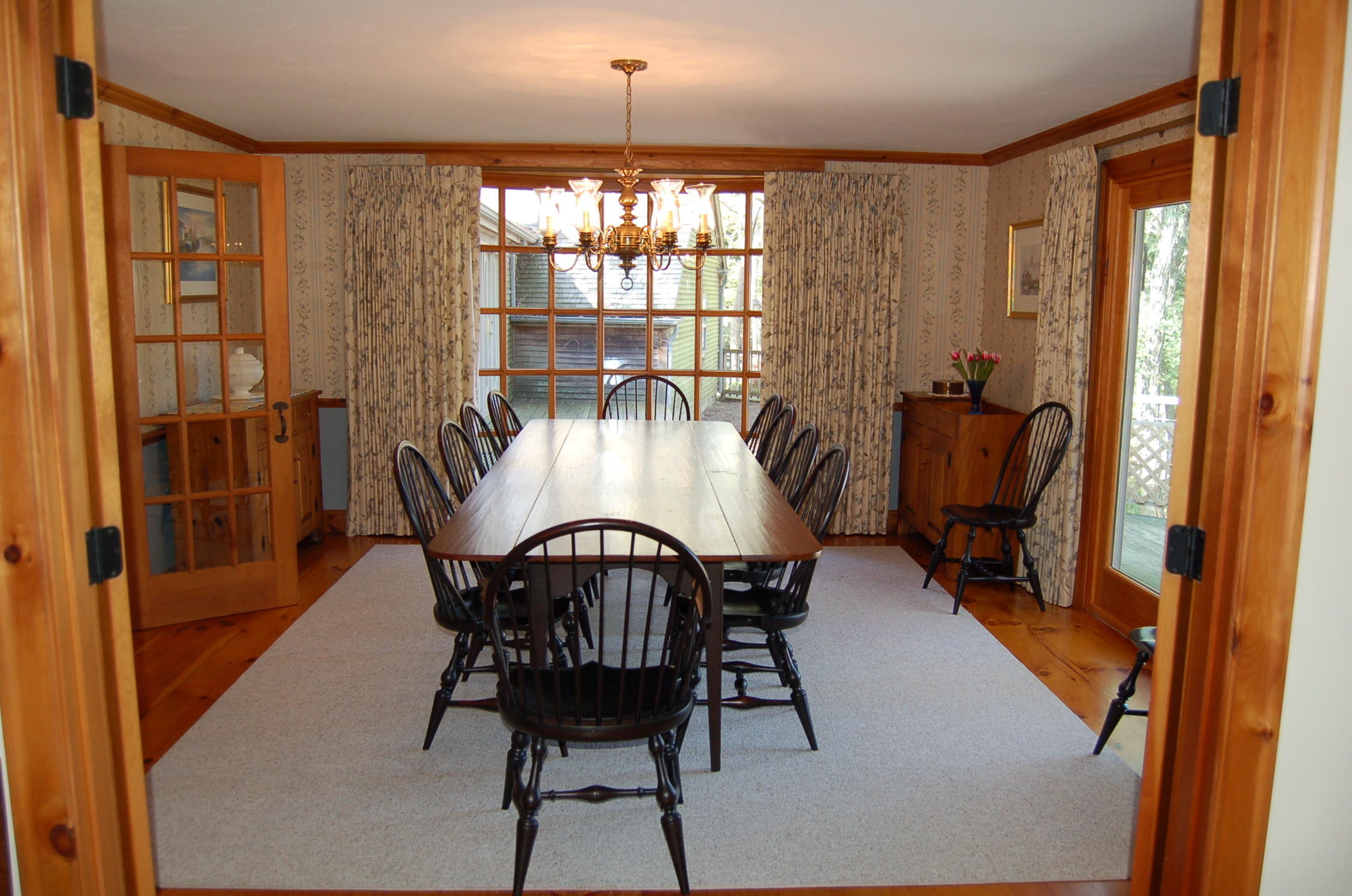 8 Hatch Road Truro, MA 02666 - Photo 4 of 27 a view of a dining room with furniture window and outside view