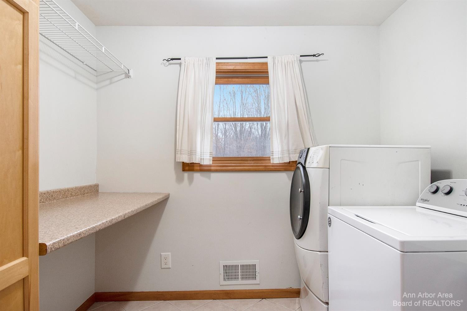 4210 Dexter-Pinckney Road Dexter, MI 48130 - Photo 27 of 44 Laundry room with lots of storage