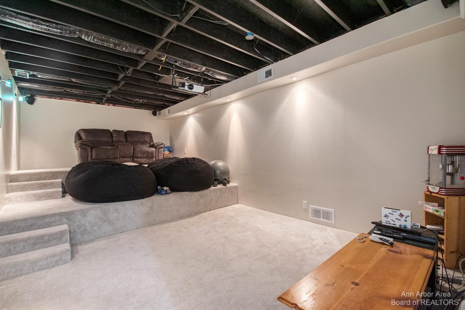 4210 Dexter-Pinckney Road Dexter, MI 48130 - Photo 41 of 44 Media room with Projector