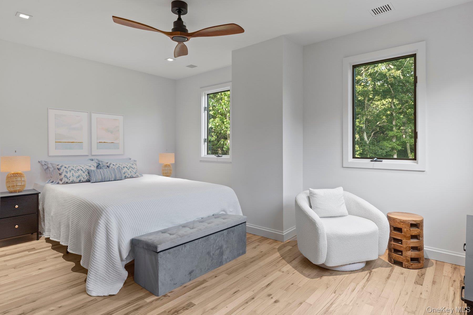 3630 Soundview Avenue Peconic, NY 11958 - Photo 18 of 44 a bedroom with a bed and a couch