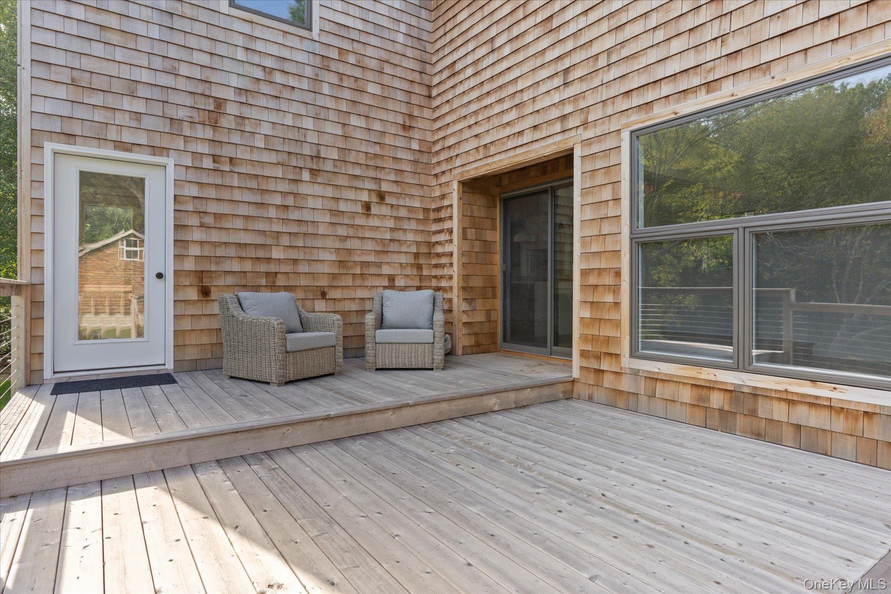 3630 Soundview Avenue Peconic, NY 11958 - Photo 21 of 44 a view of a patio with wooden floor