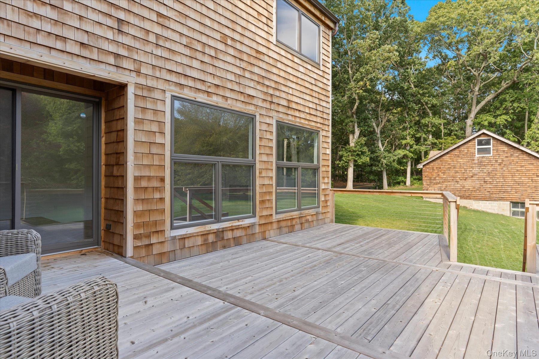 3630 Soundview Avenue Peconic, NY 11958 - Photo 22 of 44 a view of a house with a yard