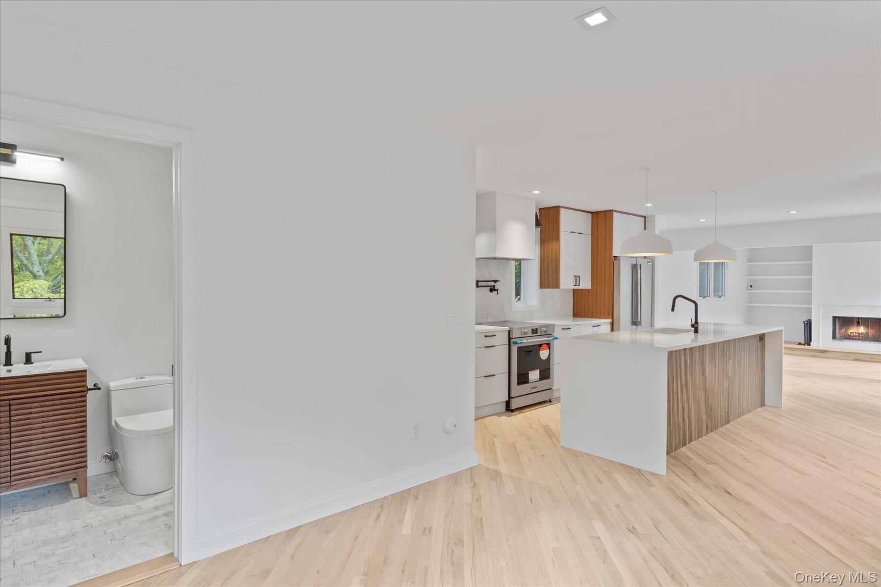 3630 Soundview Avenue Peconic, NY 11958 - Photo 5 of 44 a view of kitchen with sink and wooden floor