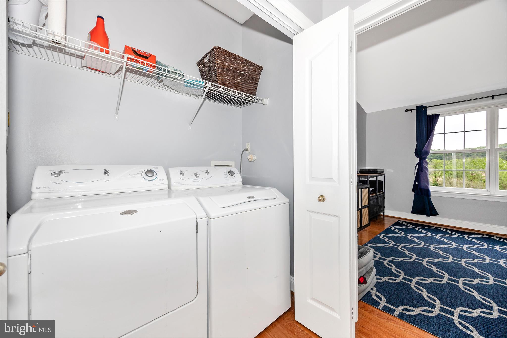 9855 McKinstry Mill Road New Windsor, MD 21776 - Photo 25 of 76 a utility room with dryer and washer