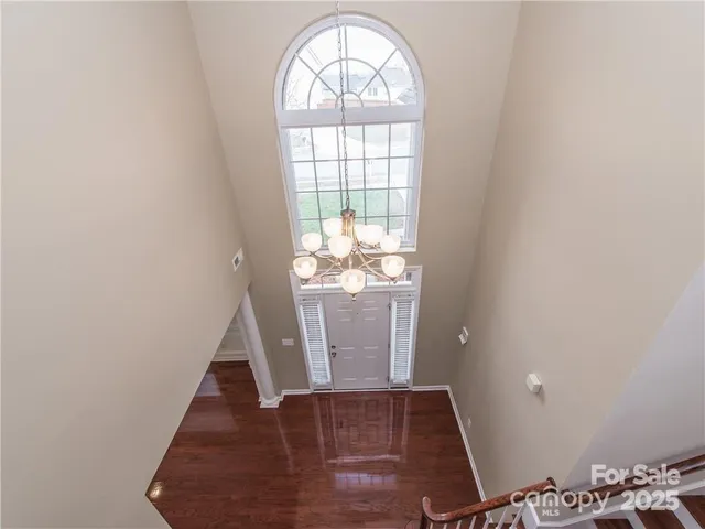 a view of entryway with wooden floor