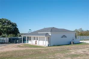 8419 West Landings Road Granbury, TX 76049 - Photo 23 of 39 a front view of a house with a yard