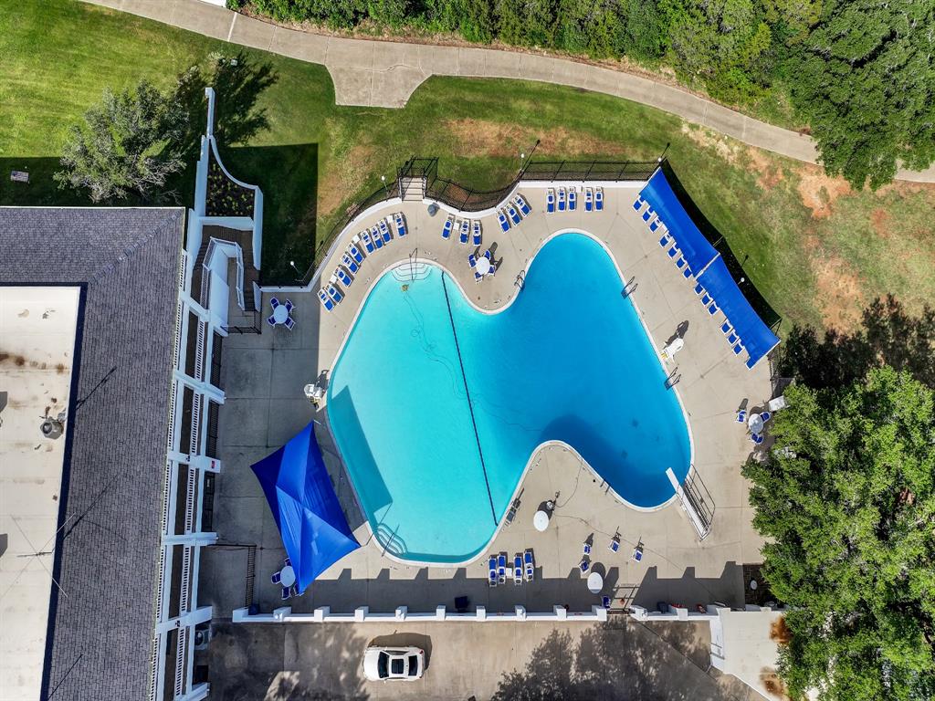8419 West Landings Road Granbury, TX 76049 - Photo 28 of 39 an aerial view of a house with a swimming pool