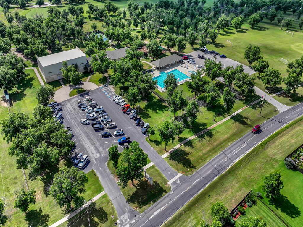8419 West Landings Road Granbury, TX 76049 - Photo 32 of 39 an aerial view of a house with a garden and lake view