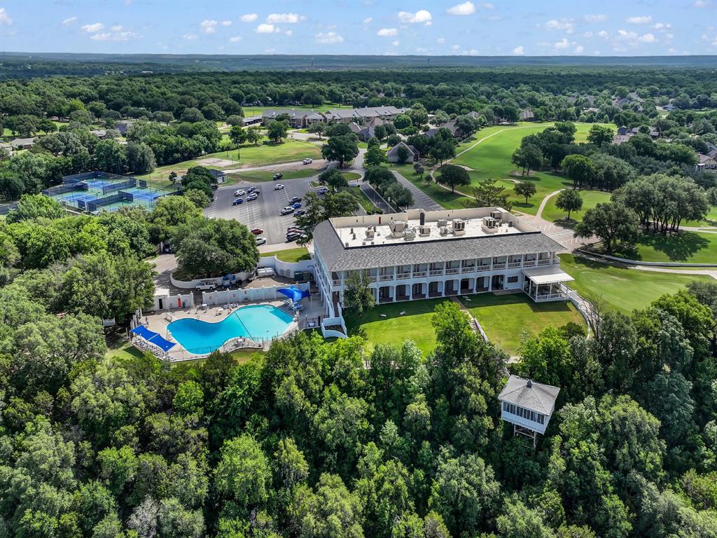 8419 West Landings Road Granbury, TX 76049 - Photo 39 of 39 an aerial view of a house with a garden and lake view