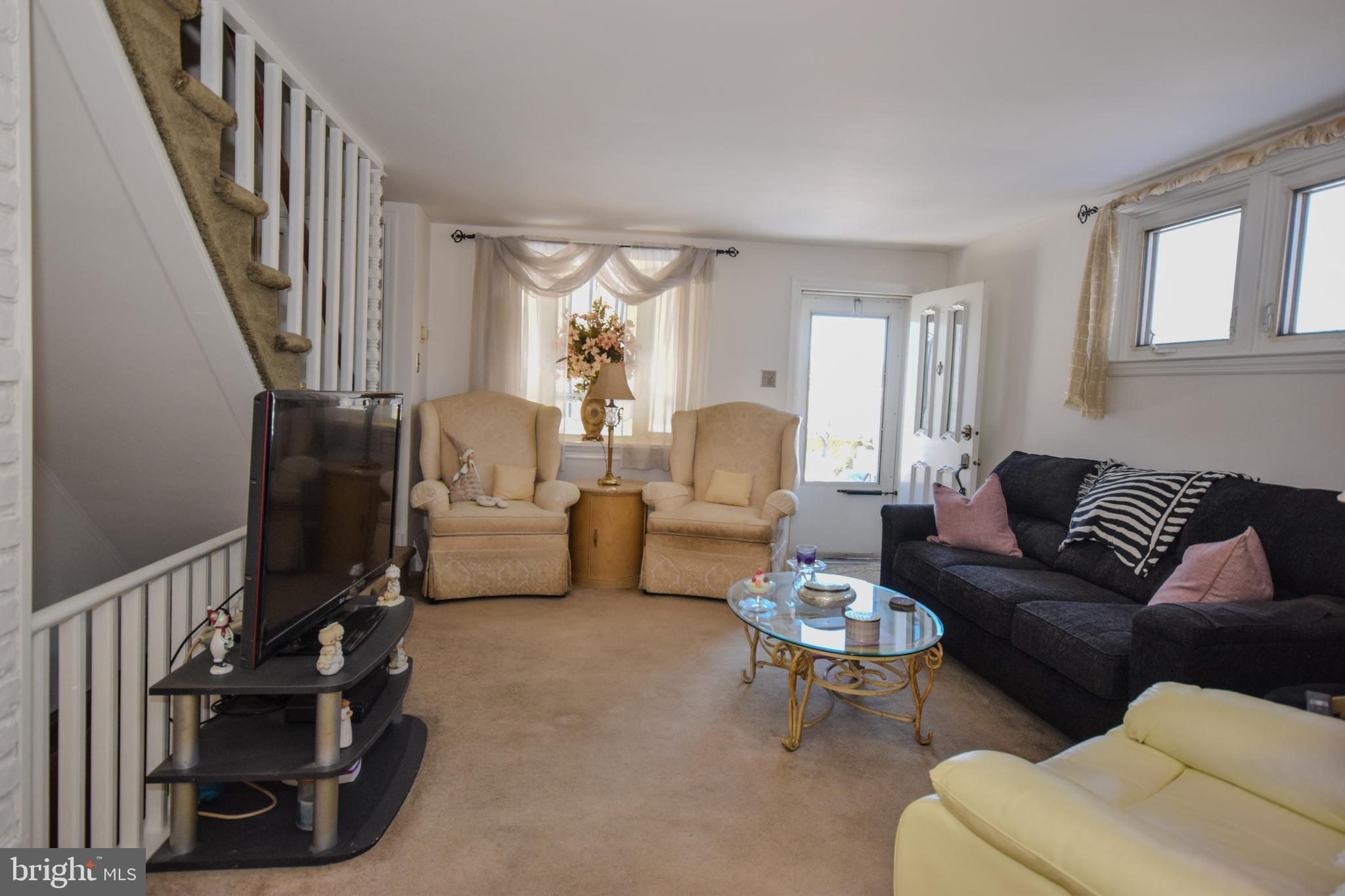 853 Gainsboro Road Drexel Hill, PA 19026 - Photo 15 of 43 a living room with furniture and a flat screen tv