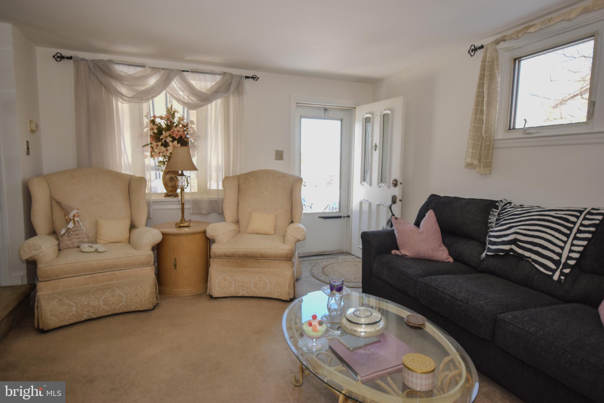 853 Gainsboro Road Drexel Hill, PA 19026 - Photo 17 of 43 a living room with furniture and a large window