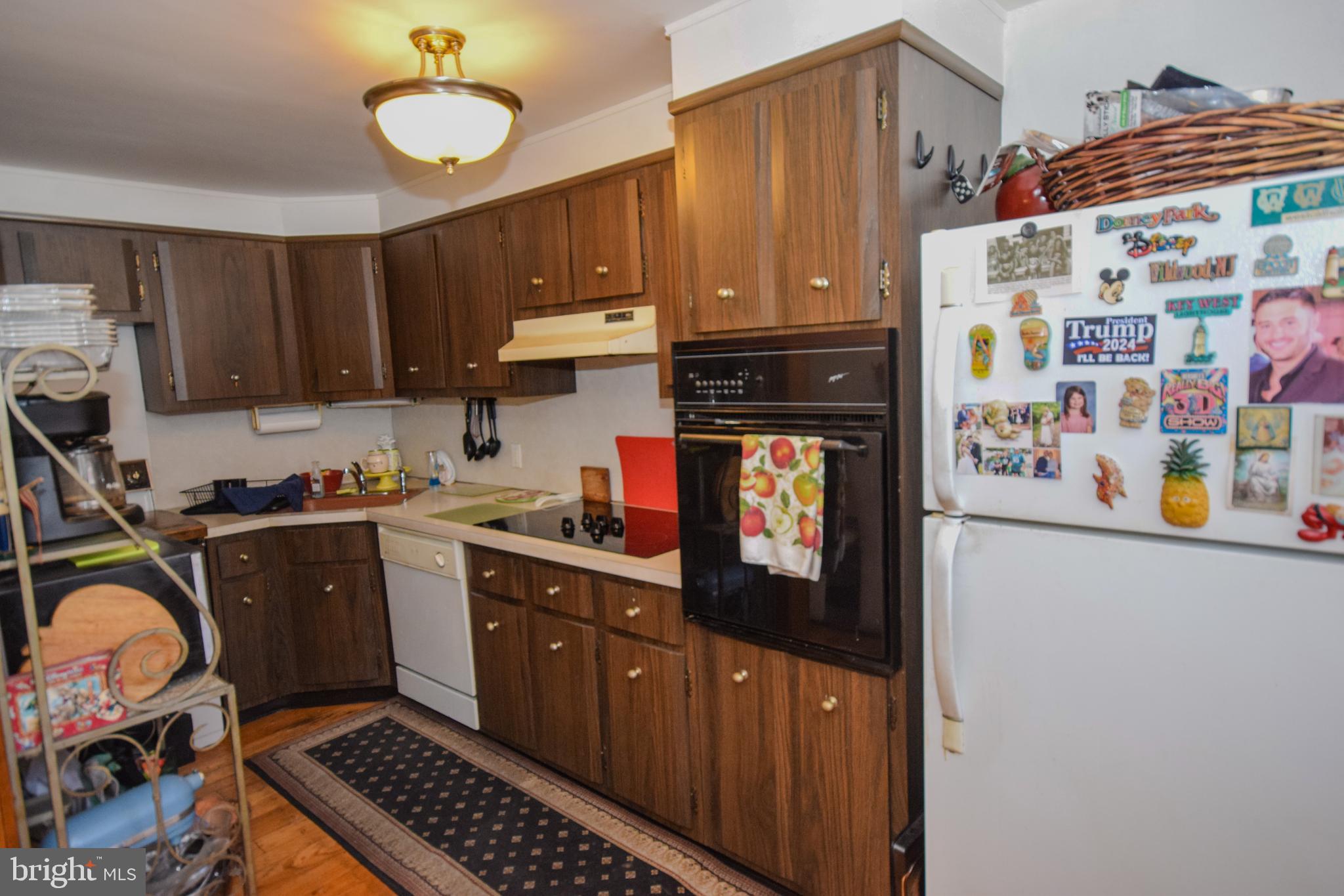853 Gainsboro Road Drexel Hill, PA 19026 - Photo 22 of 43 a kitchen with stainless steel appliances a stove a sink and cabinets