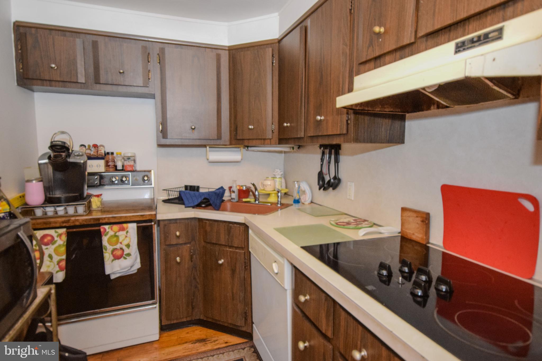 853 Gainsboro Road Drexel Hill, PA 19026 - Photo 24 of 43 a kitchen with stainless steel appliances granite countertop a sink stove and cabinets