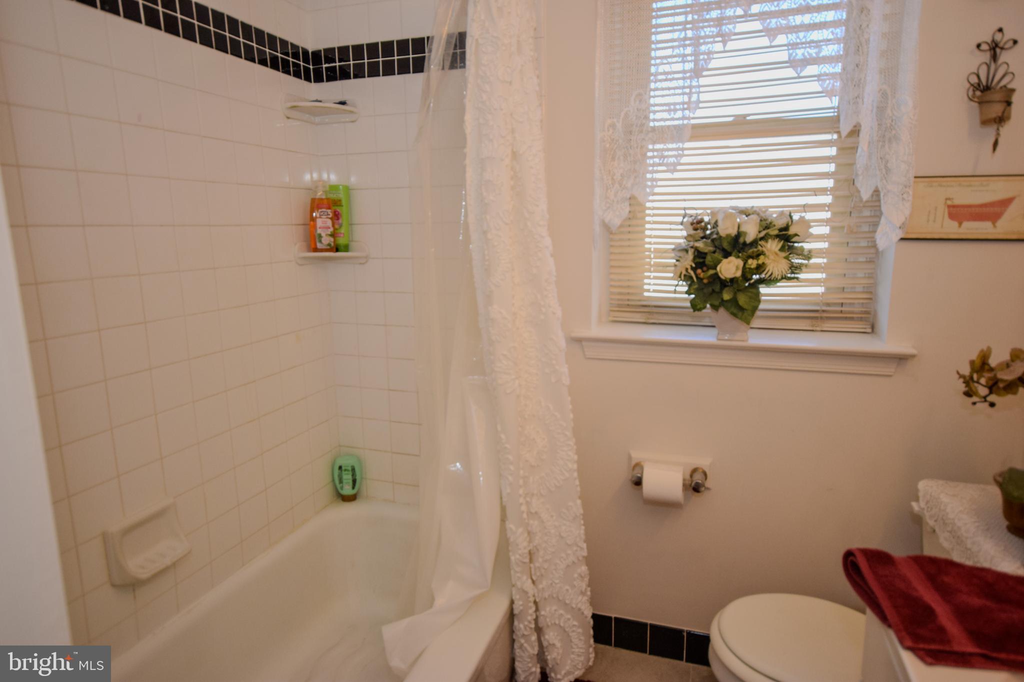 853 Gainsboro Road Drexel Hill, PA 19026 - Photo 33 of 43 a bathroom with a toilet and a shower