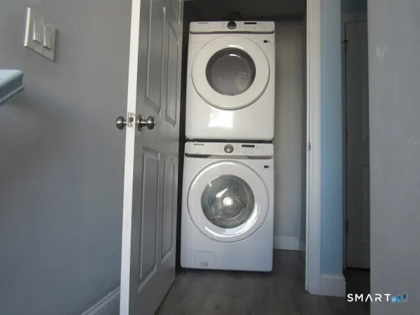 a utility room with dryer and washer