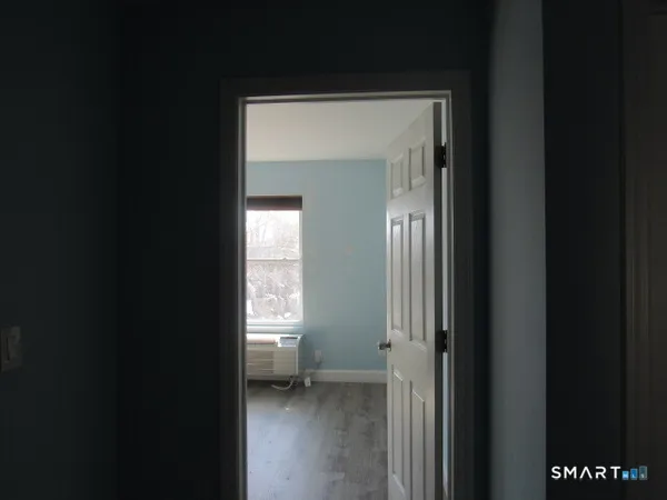 a view of a bathroom with a toilet