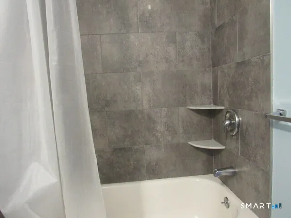 a bathroom with a bathtub