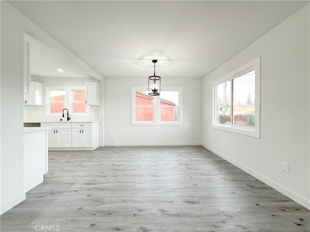 2222 East 124th Street Compton, CA 90222 - Photo 4 of 20 a view of a kitchen with marble kitchen and front door