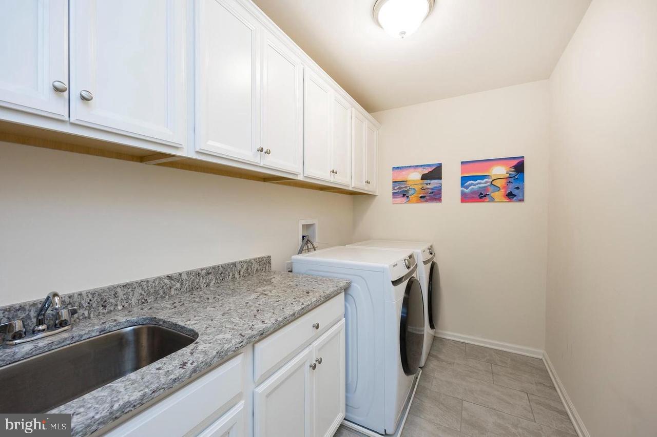 427 Lee Place Exton, PA 19341 - Photo 28 of 33 Bright and functional laundry space.
