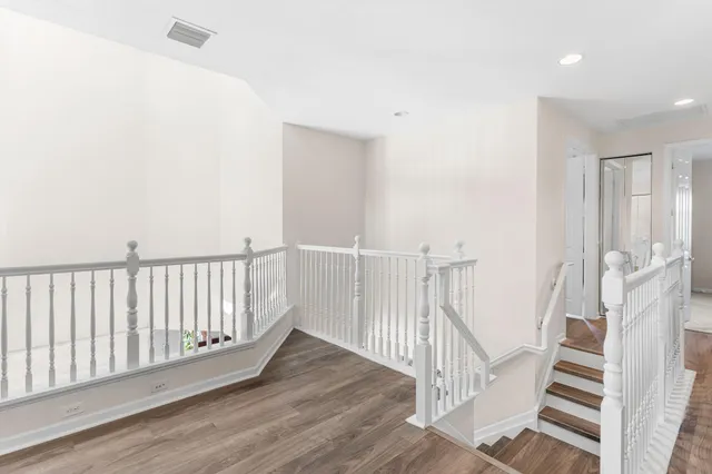 a view of entryway with wooden floor