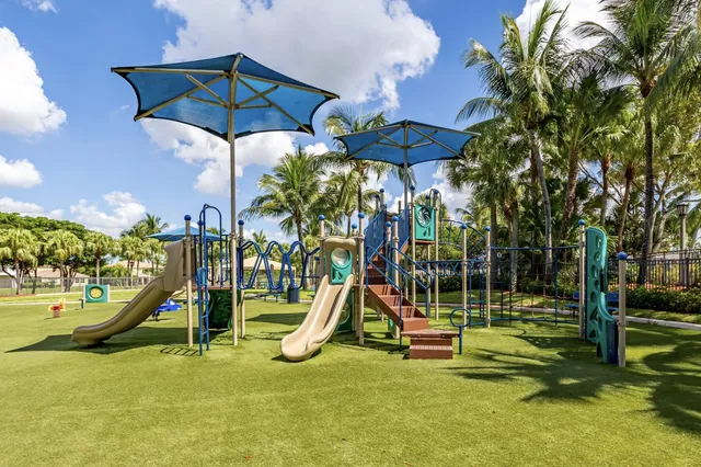 a view of a park with a slide