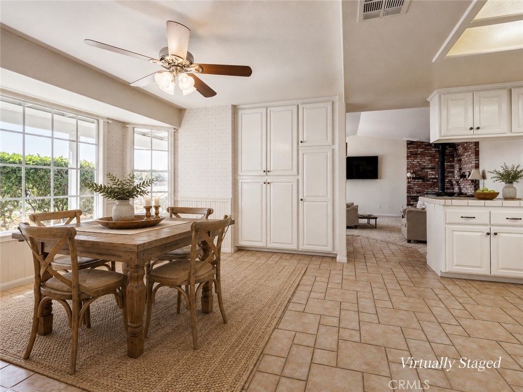 8650 Cowberry Road Phelan, CA 92371 - Photo 29 of 66 Virtually Staged Kitchen & Dining Area
