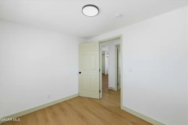 an empty room with a workspace