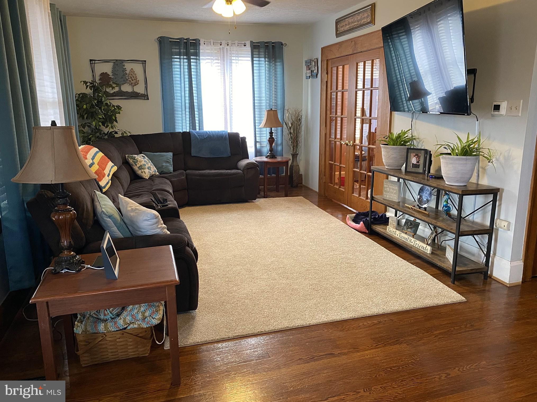 14103 Temple Street Ellerslie, MD 21529 - Photo 11 of 57 a living room with furniture and a flat screen tv