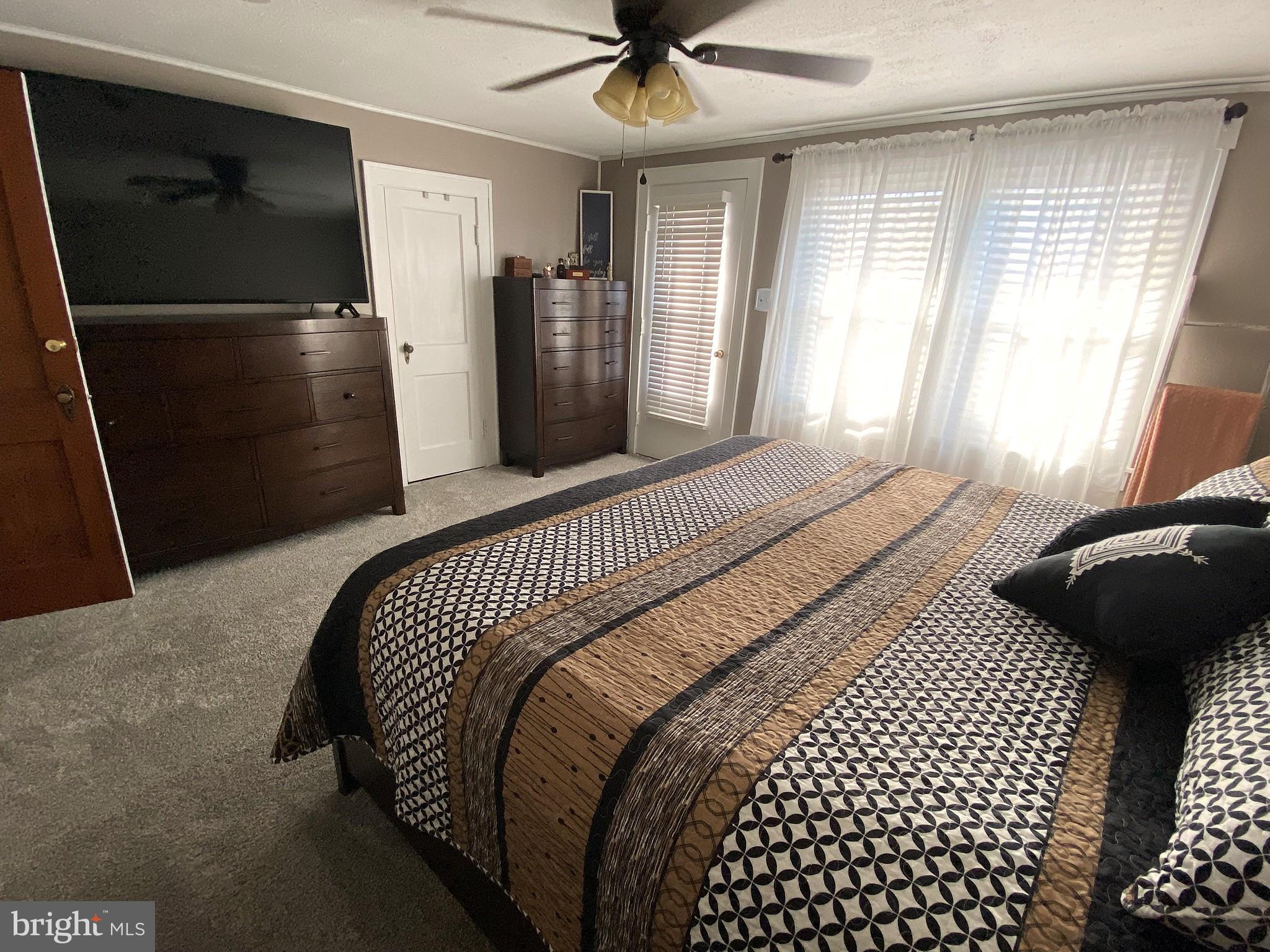 14103 Temple Street Ellerslie, MD 21529 - Photo 22 of 57 a bedroom with a bed and a window