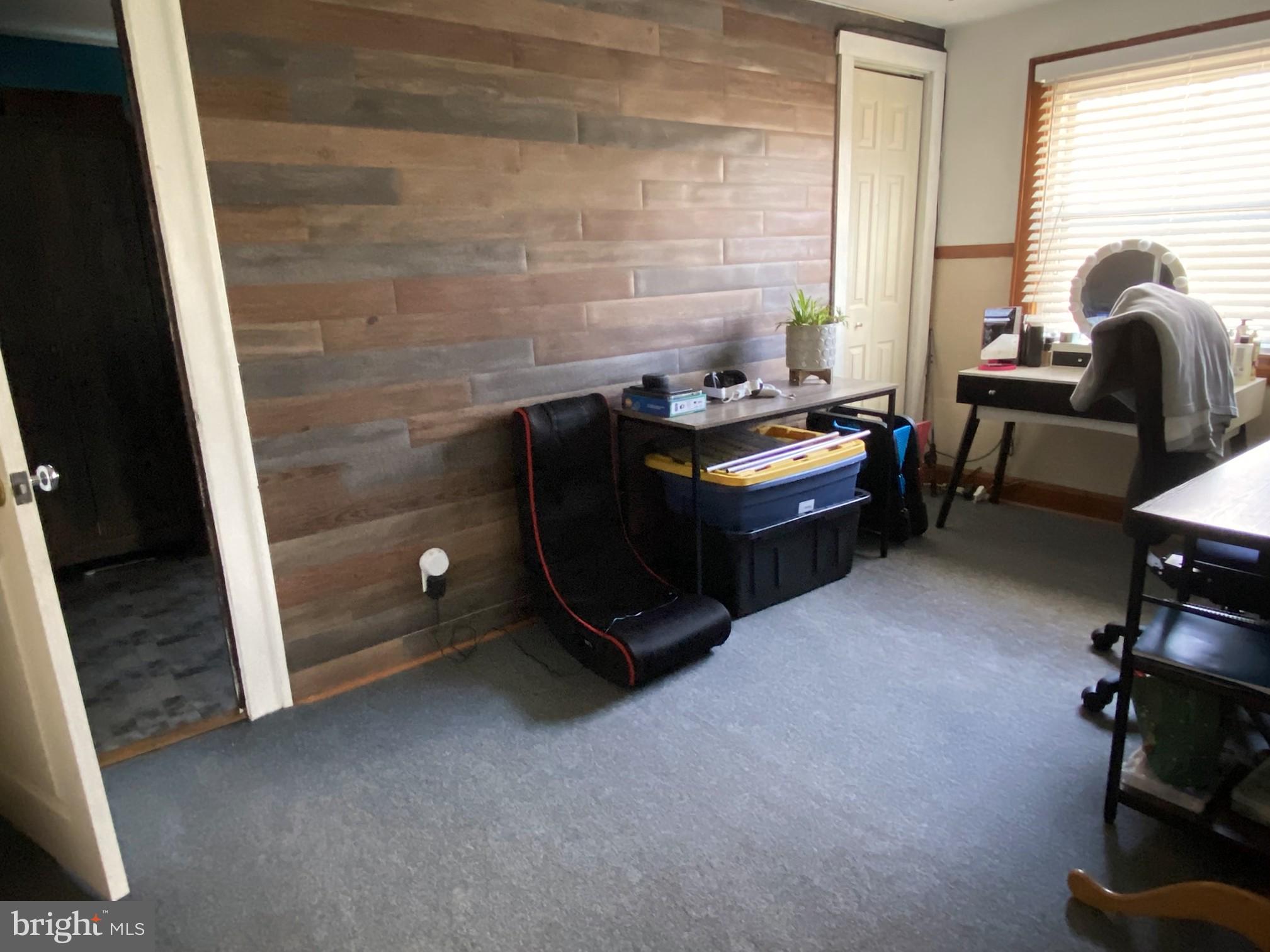 14103 Temple Street Ellerslie, MD 21529 - Photo 30 of 57 a room with furniture and a window