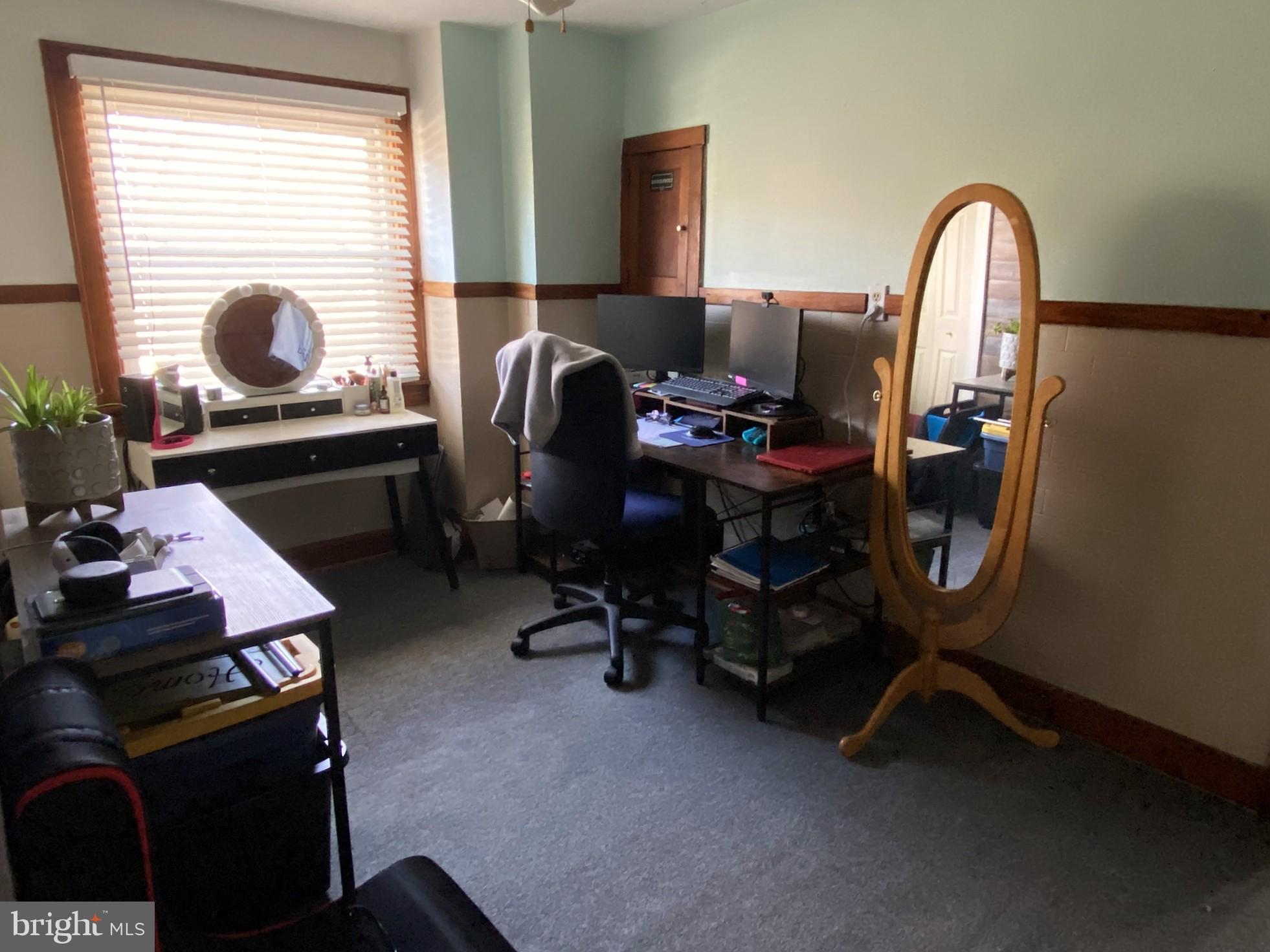 14103 Temple Street Ellerslie, MD 21529 - Photo 31 of 57 a view of workspace with windows recliner chair