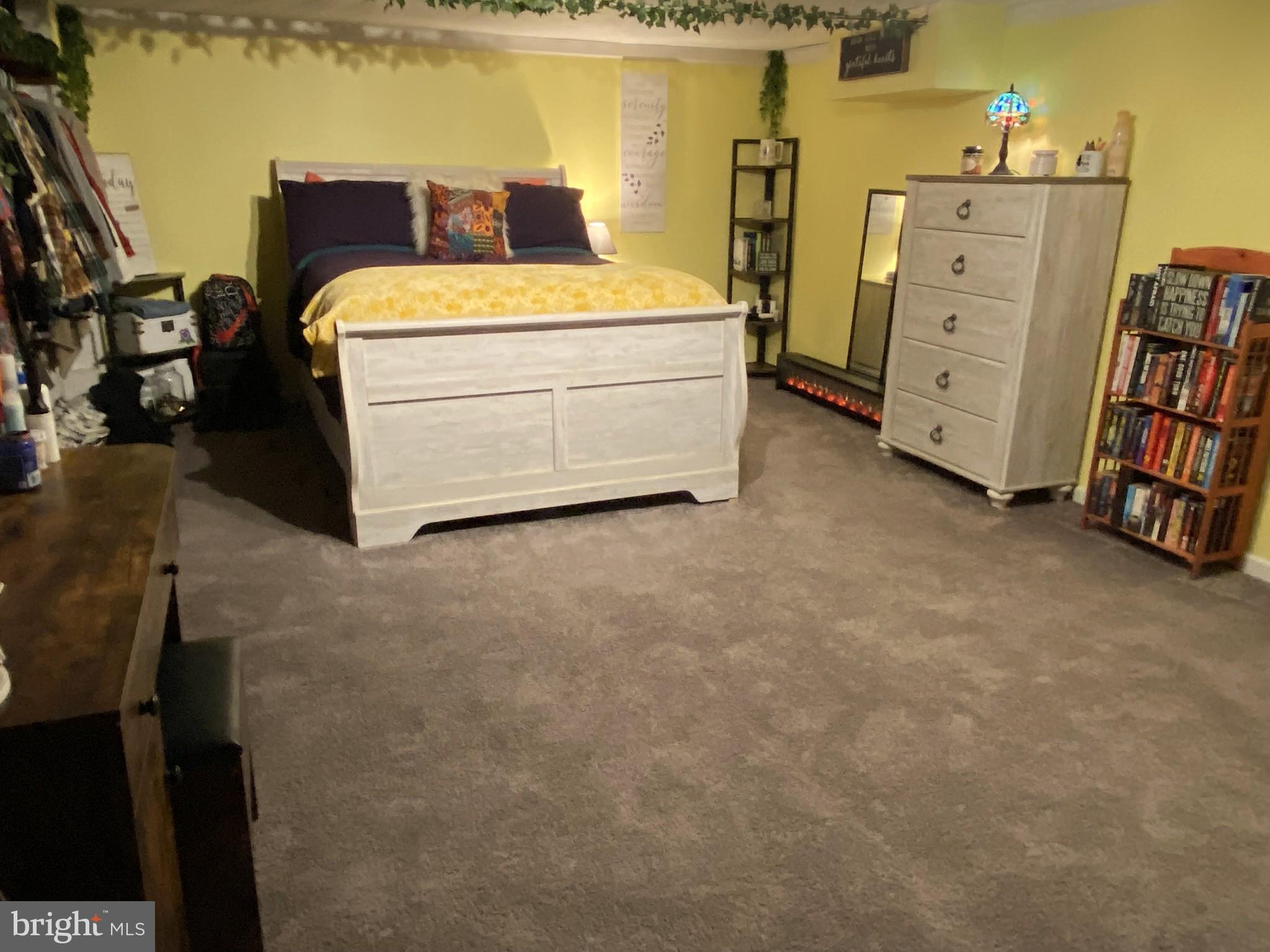 14103 Temple Street Ellerslie, MD 21529 - Photo 35 of 57 a bed room with a bed and furniture