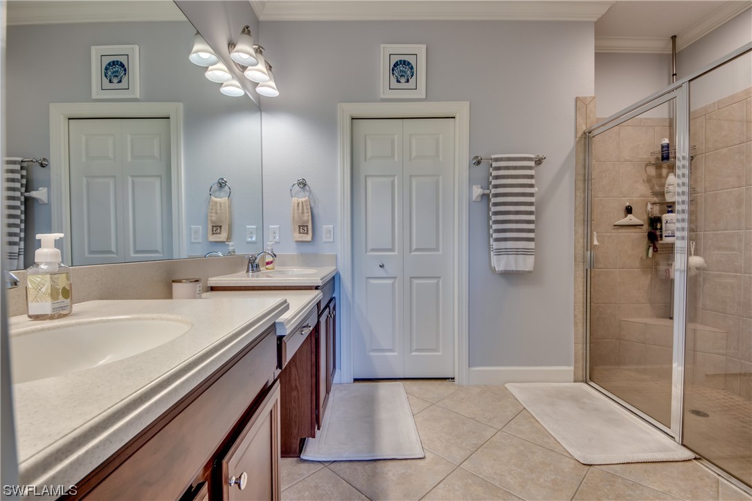 10420 Peso Del Rio Drive Fort Myers, FL 33908 - Photo 27 of 50 a bathroom with a sink a toilet and shower