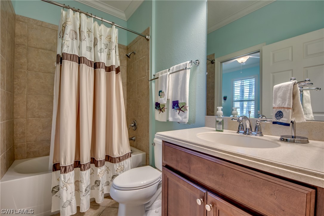 10420 Peso Del Rio Drive Fort Myers, FL 33908 - Photo 30 of 50 a bathroom with a sink a toilet a mirror and shower