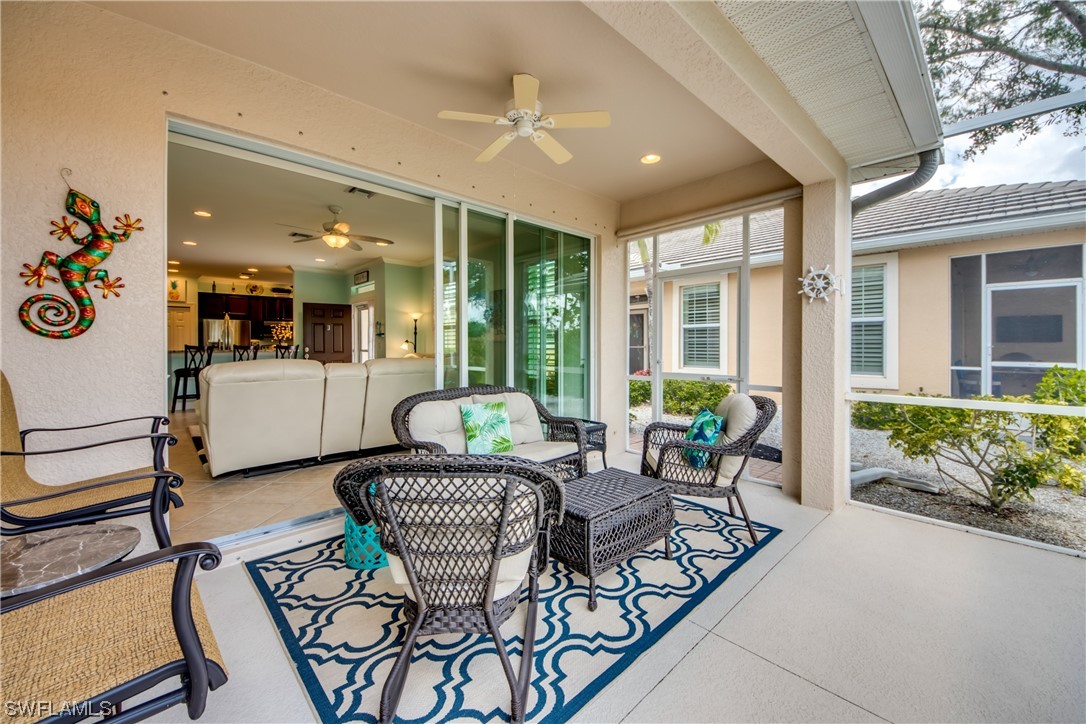 10420 Peso Del Rio Drive Fort Myers, FL 33908 - Photo 37 of 50 a outdoor space with patio furniture and garden view