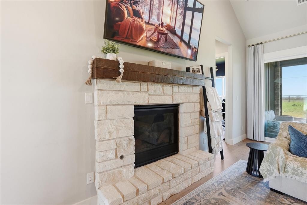 6620 Buffalo Ridge Circle Godley, TX 76044 - Photo 10 of 40 a bedroom with a bed and a couch