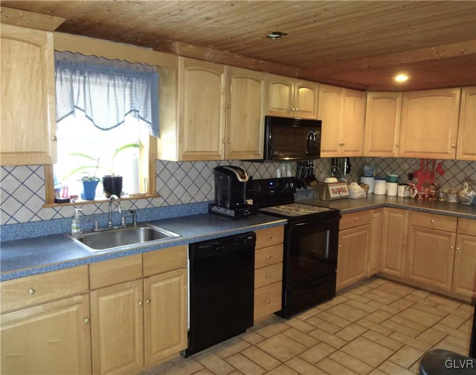 130 West Mountain Road Wind Gap, PA 18091 - Photo 11 of 43 Modern Kitchen with all appliances has a wood plan
