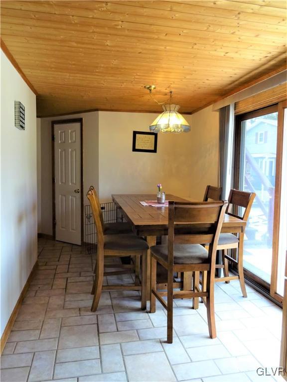130 West Mountain Road Wind Gap, PA 18091 - Photo 13 of 43 The dining area just off the kitchen opens to the
