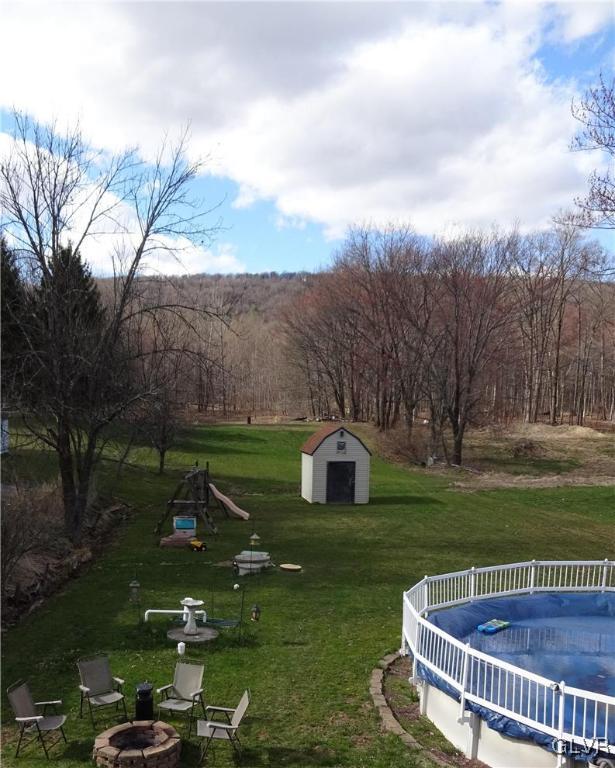 130 West Mountain Road Wind Gap, PA 18091 - Photo 33 of 43 Mountain Views, a Fire Pit, and a large yard that