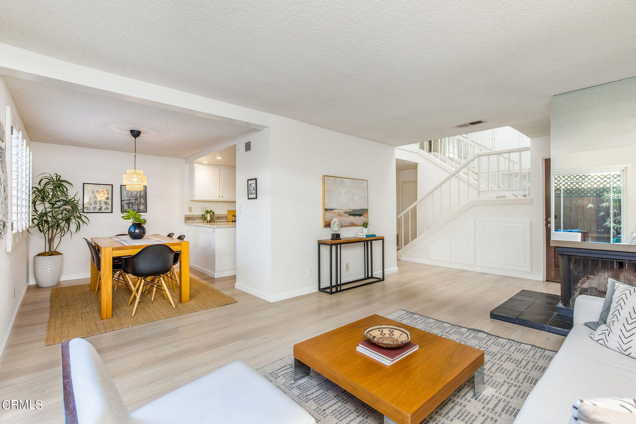 460 Fairview Avenue, Unit 12 Arcadia, CA 91007 - Photo 12 of 25 a living room with furniture rug and window