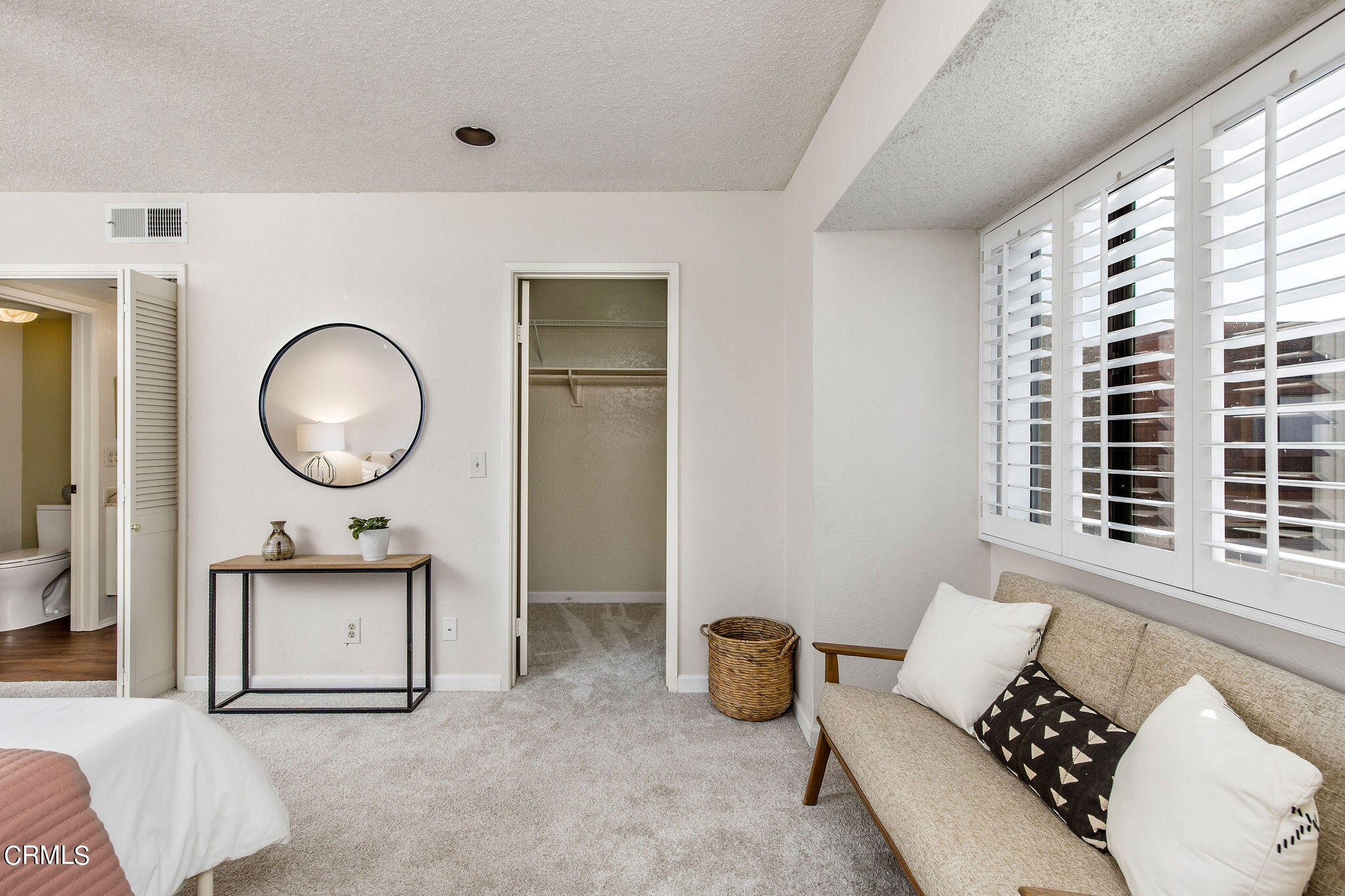 460 Fairview Avenue, Unit 12 Arcadia, CA 91007 - Photo 16 of 25 a living room with furniture a window and a lamp