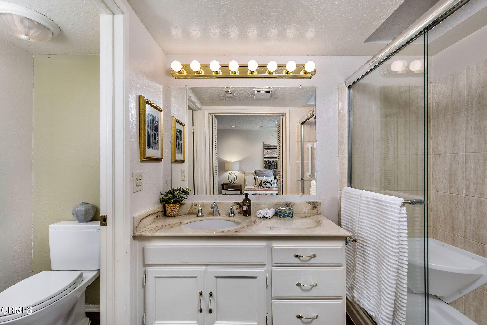 460 Fairview Avenue, Unit 12 Arcadia, CA 91007 - Photo 17 of 25 a bathroom with a sink vanity and a mirror